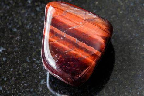 Tiger's eye gemstone showing golden-brown stripes